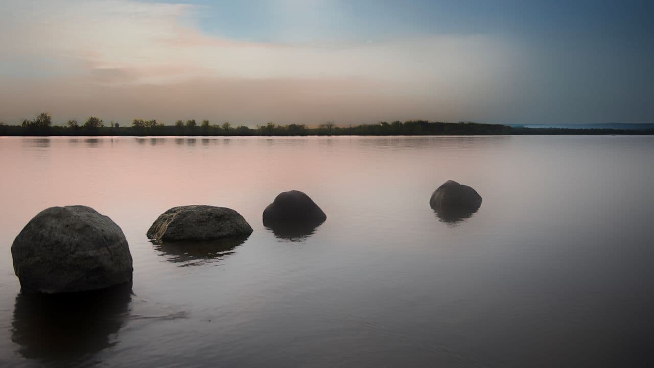 Still lake stones quiet peace imagined