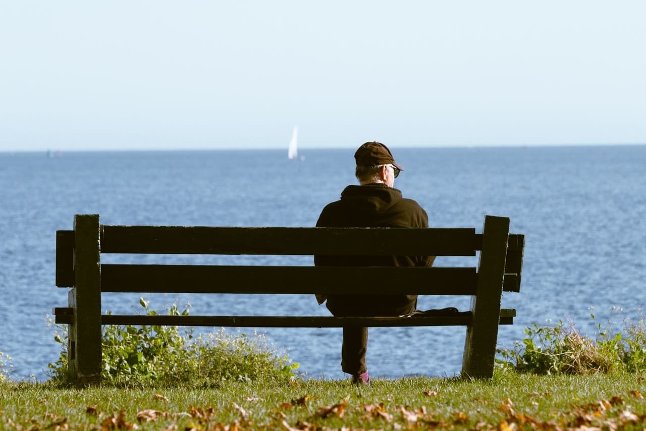 A partner taking time away to steady themselves before returning to a difficult conversation